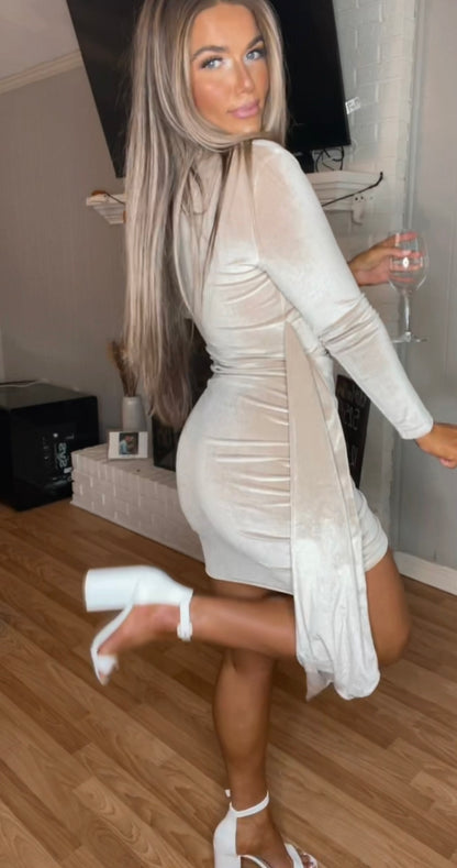 a Woman showing the back of the dress
